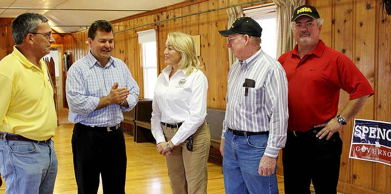 Dave Spence, Republican candidate for Missouri governor, second from left, discusses his campaign with some of the 50 Callaway County supporters gathered Wednesday at the Hatton Community Hall. Others from left are: Blake Hurst, president of the Missouri Farm Bureau; Callaway County Rep. Jeanie Riddle; Jim Zerr, a Williamsburg farmer; and Randall Kleindienst, Republican candidate for Callaway County Eastern District Commissioner.
