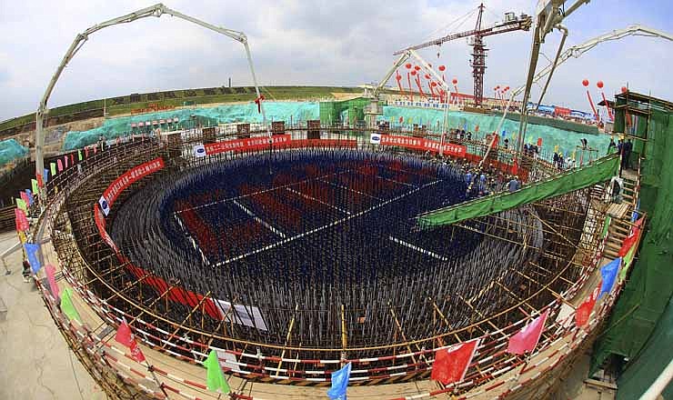 In this photo taken April 25, 2010, construction of the Changjiang Nuclear Power Plant Phase II gets underway at Tangxing village in Changjiang county in southern China's Hainan province. China said Wednesday, Oct. 24, 2012 that it is ready to approve new nuclear power plants as part of ambitious plans to reduce reliance on oil and coal, ending a moratorium imposed after Japan's Fukushima disaster last year. 