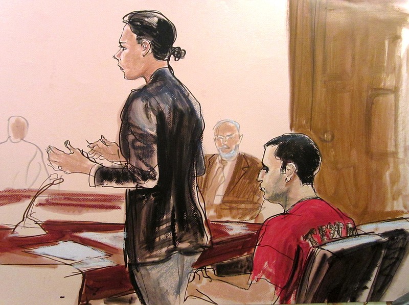 In this courtroom drawing Federal Defender Julie Gatto requests bail for her client, New York City Police Officer Gilberto Valle, right, Thursday at Manhattan Federal Court, in New York.