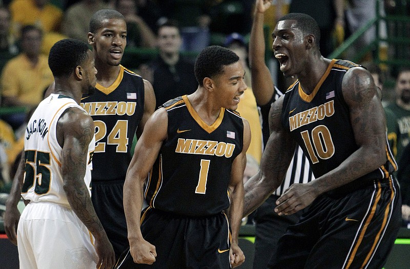 Missouri's Phil Pressey (1) is one of just two players back from last season's team. Michael Dixon is the other.