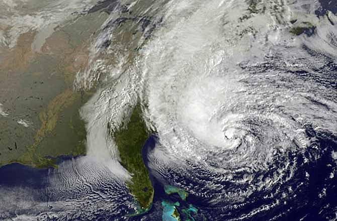 This NOAA satellite image taken Sunday, Oct. 28, 2012 shows Hurricane Sandy off the Mid Atlantic coastline moving toward the north with maximum sustained winds of 75 mph. Tens of thousands of people were ordered to evacuate coastal areas Sunday as big cities and small towns across the U.S. Northeast braced for the onslaught of a superstorm threatening some 60 million people along the most heavily populated corridor in the nation.