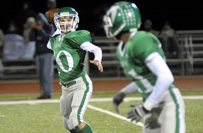 Blair Oaks quarterback Jordan Hair throws to Dominic Jamerson during last Thursday's game against Tolton/Calvary at the Falcon Athletic Complex.