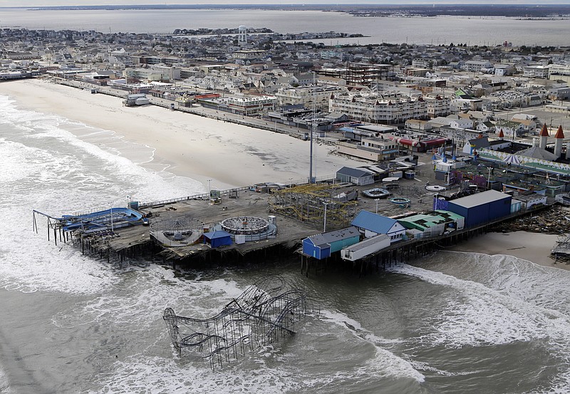 Damage to an amusement park is shown in the wake of superstorm Sandy on Wednesday in Seaside Heights, N.J. New Jersey got the brunt of Sandy, which made landfall in the state and killed six people. More than 2 million customers were without power as of Wednesday afternoon, down from a peak of 2.7 million.