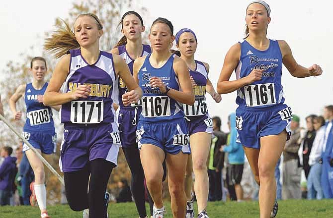 Russellville teammates Grace Young (1167) and Miranda Hill (1161) maintain their pace near the front of the field while running in the Class 1 girls race Saturday at Oak Hills Golf Center in Jefferson City. 