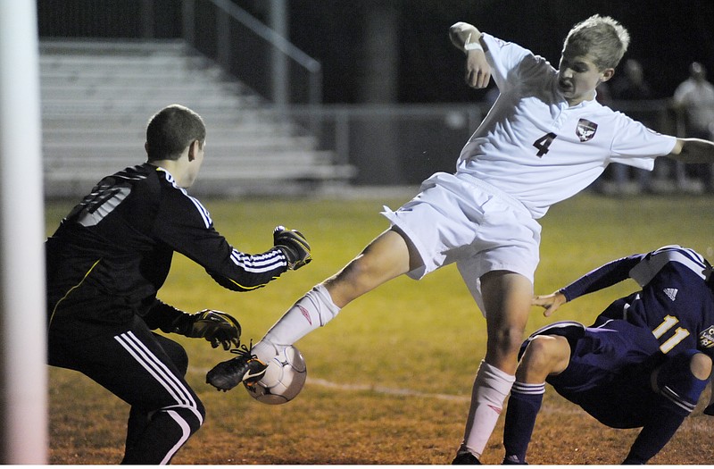 Jefferson City's Spencer Bone just misses the ball in the penalty box Thursday against Camdenton at the 179 Soccer Park. 