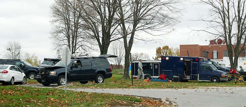 About 100 nmarked black SUVs, many of them with satellite dishes mounted on their tops, and other unmarked black vehicles converged on a site in back of Fulton State Hospital grounds Wednesday for a national earthquake response exercise coordinated by the Missouri National Guard.