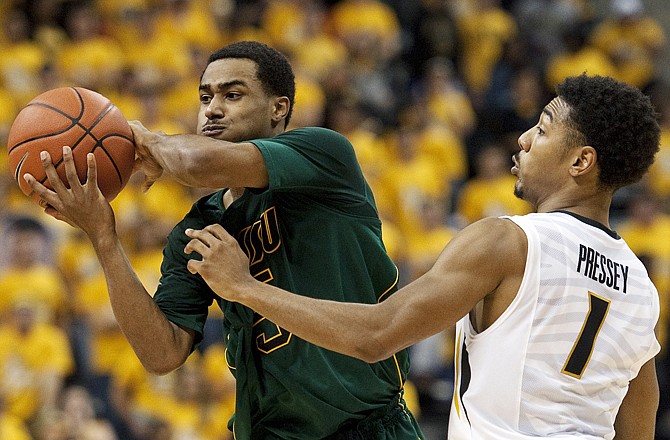 Missouri's Phil Pressey, shown defending Missouri Southern's R.J. Leverette during an exhibition game Sunday in Columbia, will have to cope with some lofty expectations being placed on him this season.