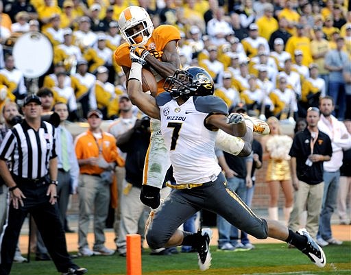 Tennessee wide receiver Justin Hunter (11) misses a pass on the goal line as Missouri's Randy Ponder (7) defends during the fourth overtime of an NCAA college football game at Neyland Stadium Saturday, Nov. 10, 2012, in Knoxville, Tenn. Missouri won 51-48 over Tennessee after four overtimes.