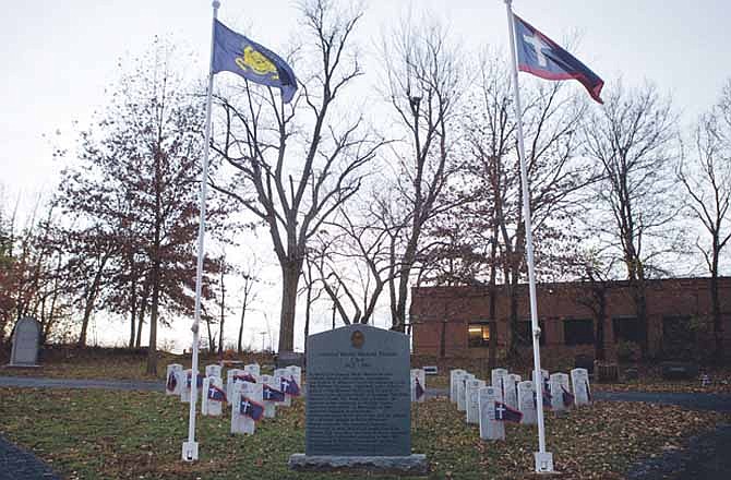 The Gen. Mosby Parsons Memorial, above, is a stop on one of Riverview Cemetery's self-guided tours.