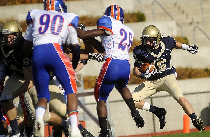 Helias running back Garrett Buschjost makes a cut during last Saturday afternoon's quarterfinal win against Clayton at Adkins Stadium.