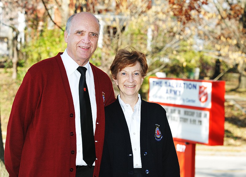 Majs. Richard and Beth Trimmell pose outside the Salvation Army office on Jefferson Street.