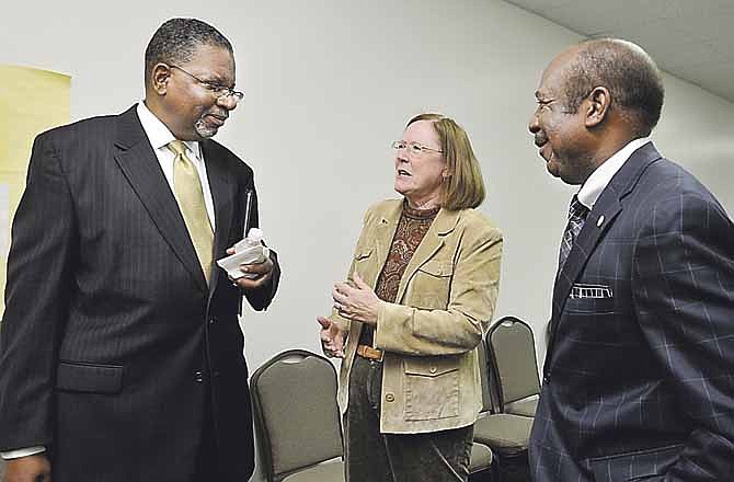 Bernard Franklin, left, visits with Cynthia Blosser and Don Cook after a breakfast sponsored by the Jefferson City Area Chamber of Commerce. Franklin is visiting the campus to be interviewed for the position of Lincoln University president. Blosser is president of the Board of Curators, and Cook is on the board.
