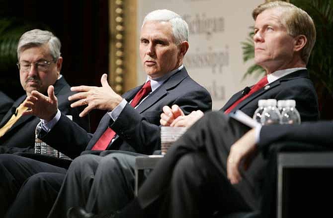 Iowa Gov. Terry Branstad, left, Indiana Gov.-Elect Mike Pence, center, and Republican Governors Association Chairman and Virginia Gov. Bob McDonnell participate in a panel discussion during the 2012 RGA Annual Conference at Encore hotel-casino Thursday, Nov. 15, 2012, in Las Vegas. Top Republicans meeting for the first time since Election Day say the party failed to unseat President Barack Obama because nominee Mitt Romney did not respond to criticism strongly enough or outline a specific agenda with a broad appeal. 