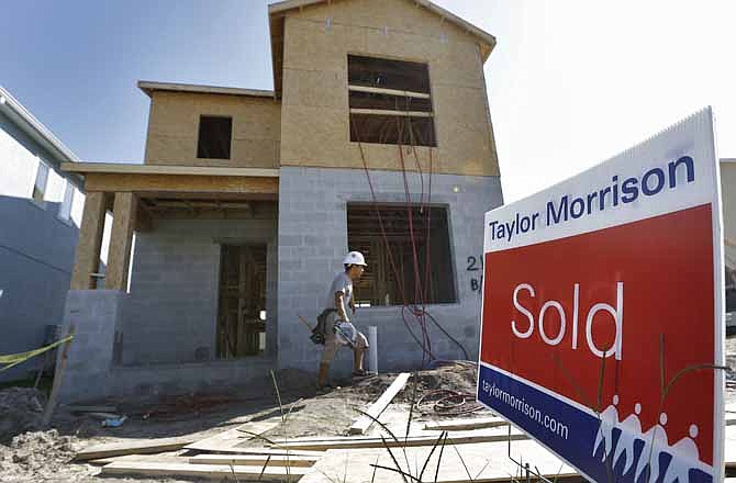  In this Wednesday, Sept. 26, 2012, file photo, a "sold" sign sits out in front of a home in Riverview, Fla. A measure of U.S. home prices jumped 5 percent in September compared with a year ago, the largest year-over-year increase since July 2006. The gain reported by CoreLogic offered more evidence of a sustainable housing recovery.