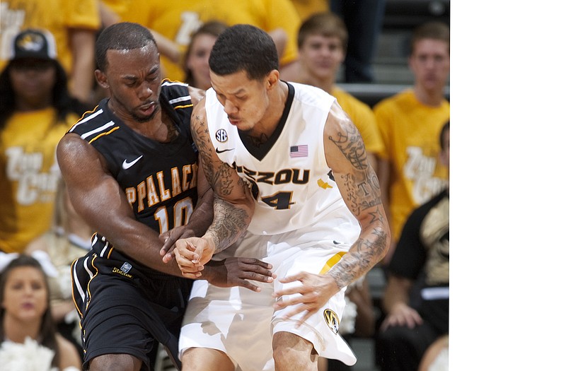 Appalachian State's Chris Burgess (left) and Missouri's Negus Webster-Chan collide as they battle for a loose ball during a game earlier this season. Webster-Chan, a freshman, has found his way into the starting lineup for Missouri.