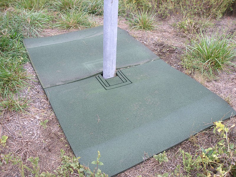 MoDOT and the Missouri Department of Natural Resources have joined together to use mats made from recycled tires to control weeds that grow around highway sign posts, making the mowing of U.S. 54 more efficient and environmentally friendly.