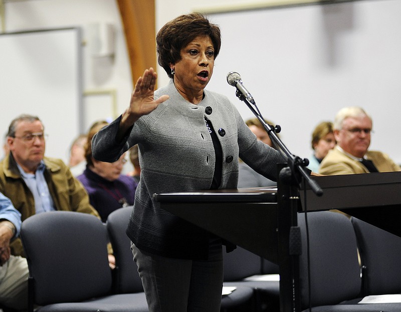 Jackie Coleman, who served for 15 years as a board member with the Jefferson City Public Schools Board of Education, voices her concerns while addressing the current board during an open forum at Monday night's meeting.