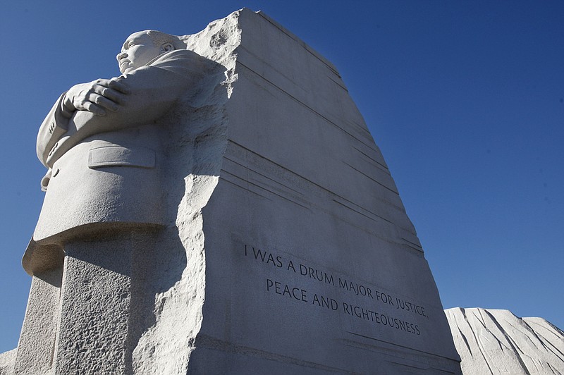 Interior Secretary Ken Salazar endorsed a plan Tuesday to remove a disputed inscription from the Martin Luther King Jr. Memorial, above, rather than cut into the granite to replace it with a fuller quotation.