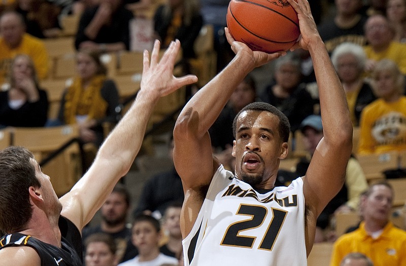 Missouri's Laurence Bowers shoots a three-point shot over Appalachian State's Nathan Healy during the first half Dec. 1 in Columbia, Mo. Bowers had 21 first half points in the game.