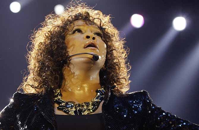In this Sunday, April 25, 2010, file photo, U.S singer Whitney Houston performs at the o2 in London as part of her European tour, Sunday, April 25, 2010. Whitney Houston was the "top trending" search of 2012 according to Google Inc.'s year-end "zeitgeist" report. Google's 12th annual roundup is "an in-depth look at the spirit of the times as seen through the billions of searches on Google over the past year," the company said in a blog post Wednesday. 