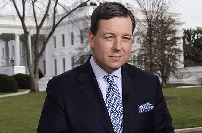 This Nov. 30, 2012 publicity photo provided by FOX News Channel shows Chief White House Correspondent Ed Henry reporting outside of the White House in Washington, D.C. Henry, 41, is preparing for four more years on the beat and would like to cover the Obama administration from beginning to end. He came to Fox in 2011 from CNN, for whom he had worked in Washington since 2004.