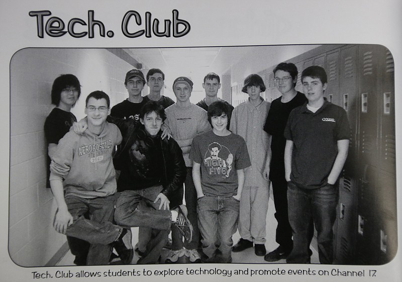 This undated photo shows Adam Lanza, third from the right, posing for a group photo of the technology club which appeared in the Newtown High School yearbook. Authorities have identified Lanza as the gunman who killed his mother at their home and then opened fire Friday, Dec. 14, 2012, inside an elementary school in Newtown, Conn., killing 26 people, including 20 children, before killing himself. Richard Novia, a one-time adviser to the technology club, verified that the photo shows Lanza. 