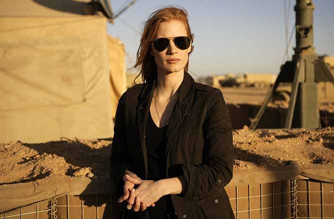 This undated publicity film image provided by Columbia Pictures Industries, Inc. shows Jessica Chastain playing a member of the elite team of spies and military operatives stationed in a covert base overseas who secretly devoted themselves to finding Osama Bin Laden in Columbia Pictures' gripping new thriller directed by Kathryn Bigelow, "Zero Dark Thirty." 