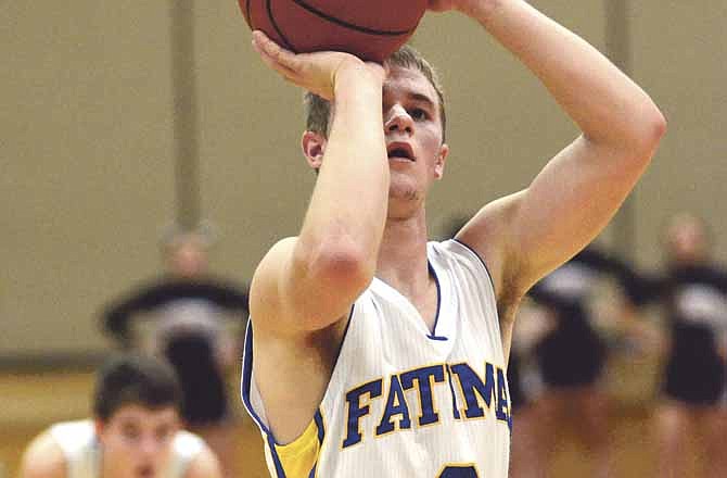 Patrick Schnieders of Fatima shoots a free throw during Saturday night's game against Southern Boone in the National Guard Shootout at Fleming Fieldhouse.