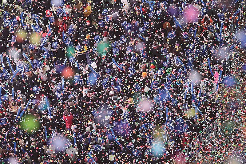 Confetti falls over revelers in New York's Times Square as the clock struck midnight during the 2010 New Year's Eve celebration.  The holidays often mean an excess of booze and drugs. Occasional drinkers fail to moderate and addiction programs around the country note upticks in patient loads soon after the new year, high season for relapsers and those seeking treatment for the first time.