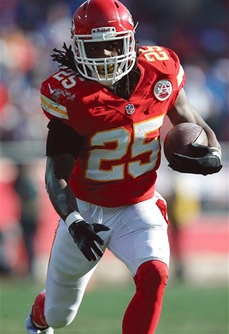 Chiefs running back Jamaal Charles runs during Sunday's game against the Colts in Kansas City. Charles ran for 226 yards but the Chiefs lost to the Colts.