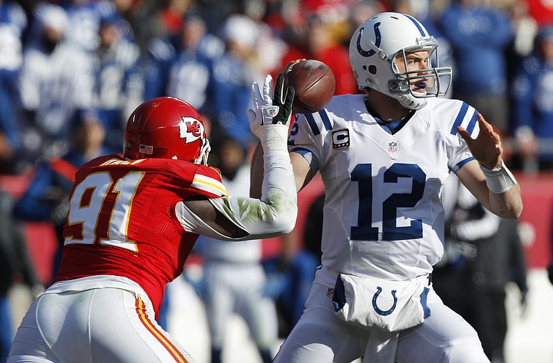 Colts quarterback Andrew Luck tries to throw under pressure from Chiefs linebacker Tamba Hali during last Sunday's game at Arrowhead Stadium. Luck was the No. 1 overall draft pick in April, a spot the Chiefs may be picking from next year.