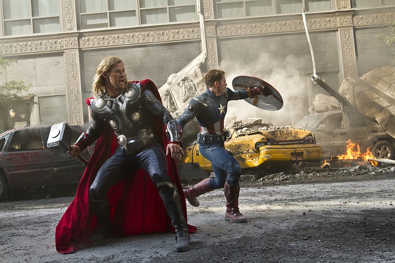 Chris Hemsworth portrays Thor, left, and and Chris Evans portrays Captain America, in a scene from "The Avengers," expected to be released last May. The film industry saw an increase in ticket sales in 2012, a projected 5.6 percent increase from 2011. 