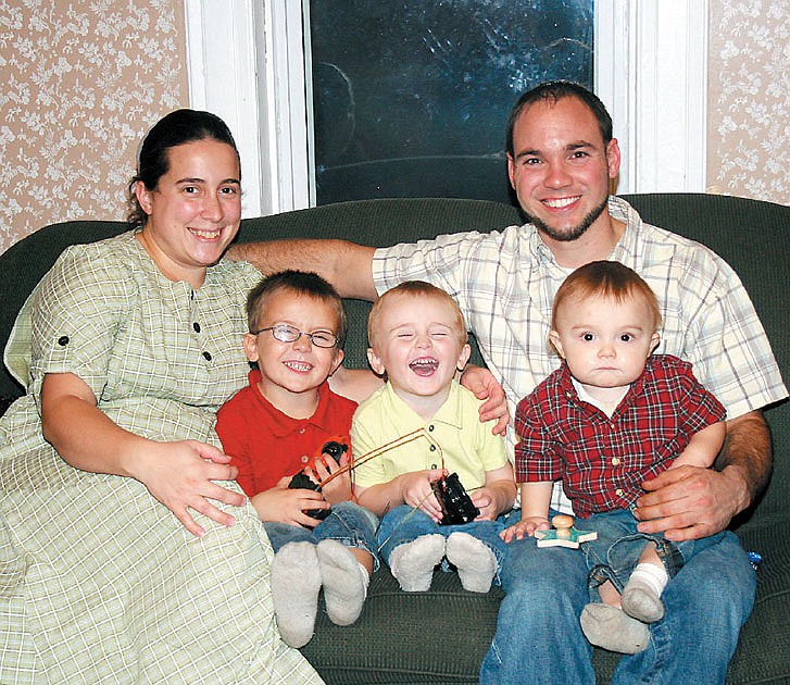 Isaac Alexander Wininger, the 2012 First Baby of Moniteau County Contest winner, will celebrate his first birthday Sunday, Jan. 6, 2013. From left are Isaac's mother Rachel and his brothers David, 4 1/2, and
Isaiah, 3.