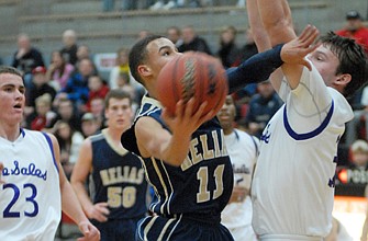 Helias' Isiah Sykes goes up for a shot during Friday's game against St. Francis DeSales in the Joe Machens Great 8 Classic at Fleming Fieldhouse.