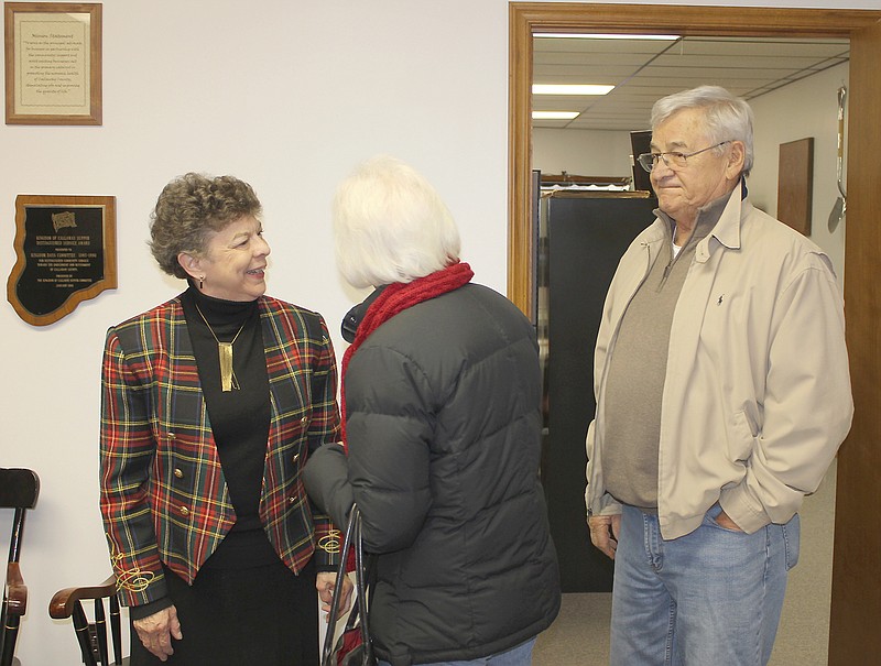 Outgoing Kingdom of Callaway Chamber of Commerce Director Nancy Lewis greets Genevieve and Bill Conner Friday during her retirement reception.l A number of area business people turned out to show their appreciation for everything Lewis has done for the community over the last 21 years.