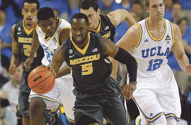 Missouri's Keion Bell makes his way down court during the Tigers' game at UCLA on Friday.
