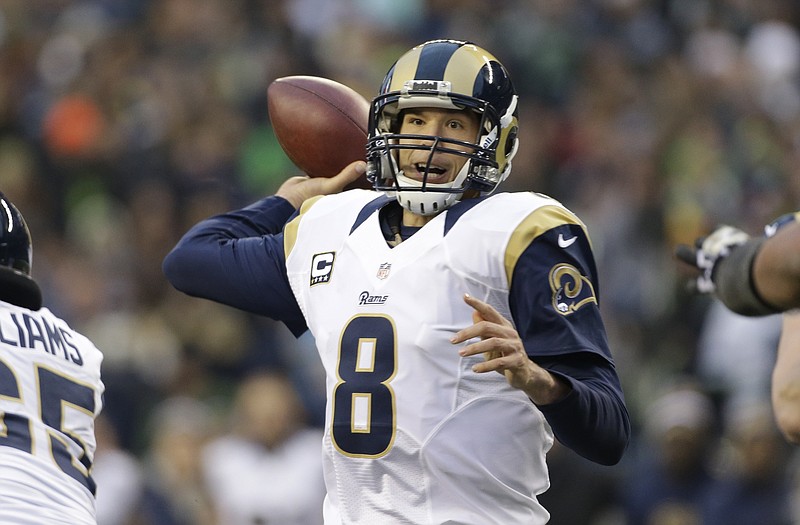 Rams quarterback Sam Bradford throws against the Seahawks in the second half Sunday in Seattle.