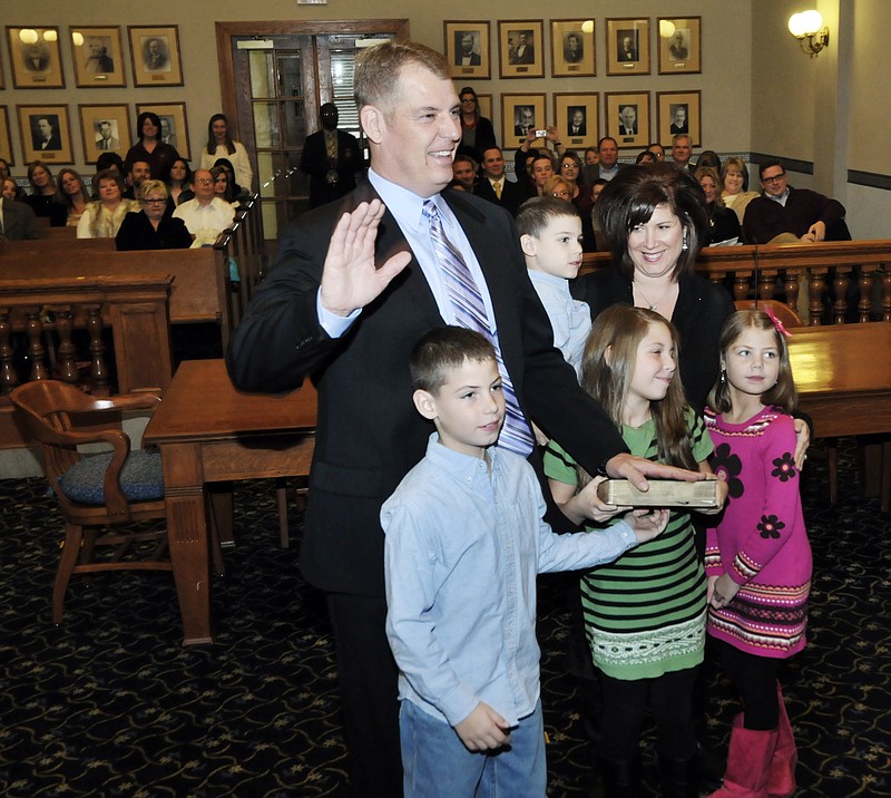 Newly elected Cole County Western District Commissioner Kris Scheperle had his family with him Monday as he repeated his oath of office in a courthouse ceremony. With Scheperle are his wife, Jennifer, sons Charlie, 7, and Adam, 4, and daughters Hannah, 9, in green and Elly, 7. 