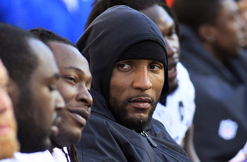 Ravens linebacker Ray Lewis sits on the bench in the second half of Sunday's game against the Bengals in Cincinnati.