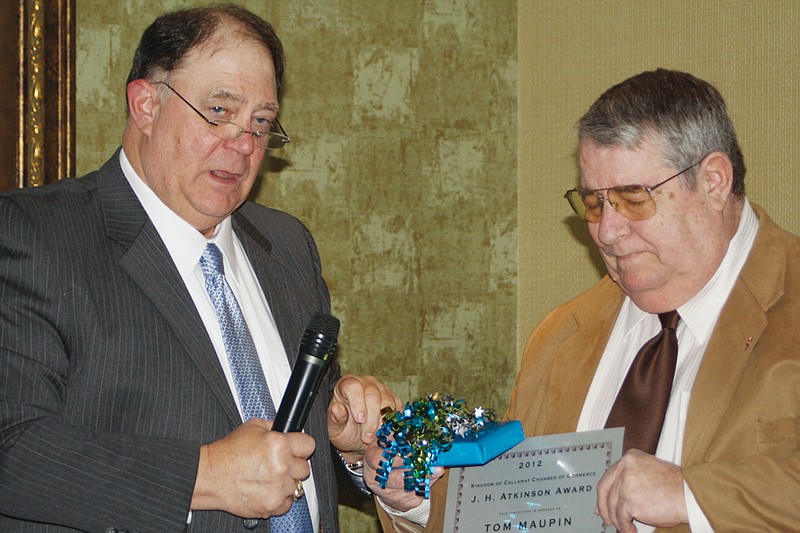 Tom Maupin, right, receives the Chamber's premier honor, the J. H. Atkison Award, from awards chairman Steve Myers at the 2012 Kingdom of Callaway Chamber of Commerce banquet. This year's banquet's theme will be "Making the World of Difference Within our Community," and will be held Jan. 11 at Tucker Dining Hall of William Woods University.