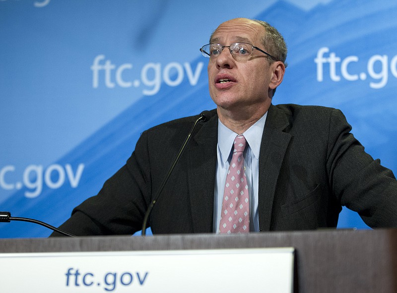 Federal Trade Commission (FTC) Chairman Jon Leibowitz speaks during a news conference at FTC in Washington, Thursday to announce that Google is agreeing to license certain patents to mobile phone rivals and stop a practice of including snippets from other websites in its search results as part of a settlement to end a 19-month investigation in the search leader's business practices.