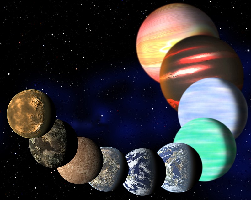 This artist rendering released Monday by Harvard-Smithsonian Center for Astrophysics shows the different types of planets in the Milky Way galaxy detected by NASA's Kepler spacecraft. A new analysis of Kepler data found there are at least 17 billion planets the size of Earth.