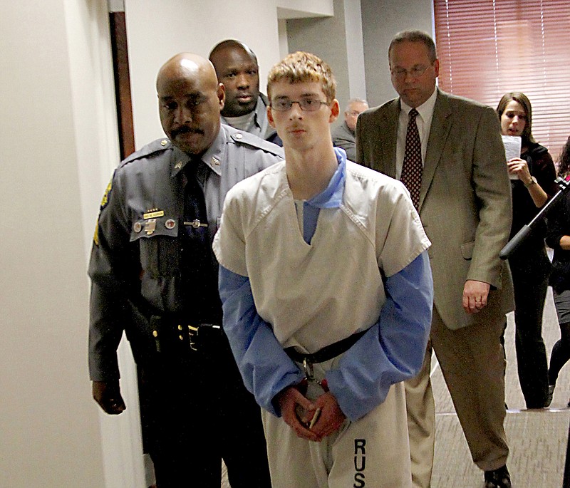 Derek Shrout, 17, is escorted into the Russell County Courthouse on Monday in Phenix City, Ala., to face an attempted assault charge after authorities say he planned to use homemade explosives in a terrorist attack on fellow students at his school.