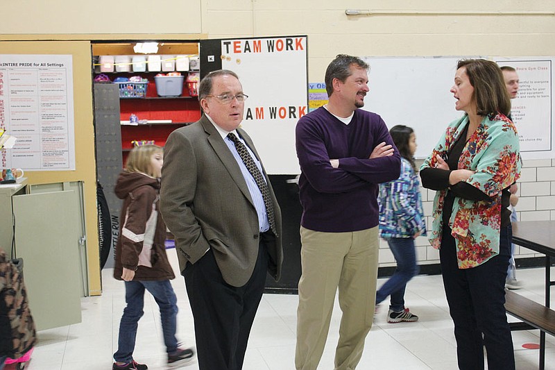 Fulton Public School superintendent Jacque Cowherd Cowherd, Dennis Depping and Katherine Christensen chat between lunch and a classroom tour during their work session visit at McIntire Elementary Wednesday.