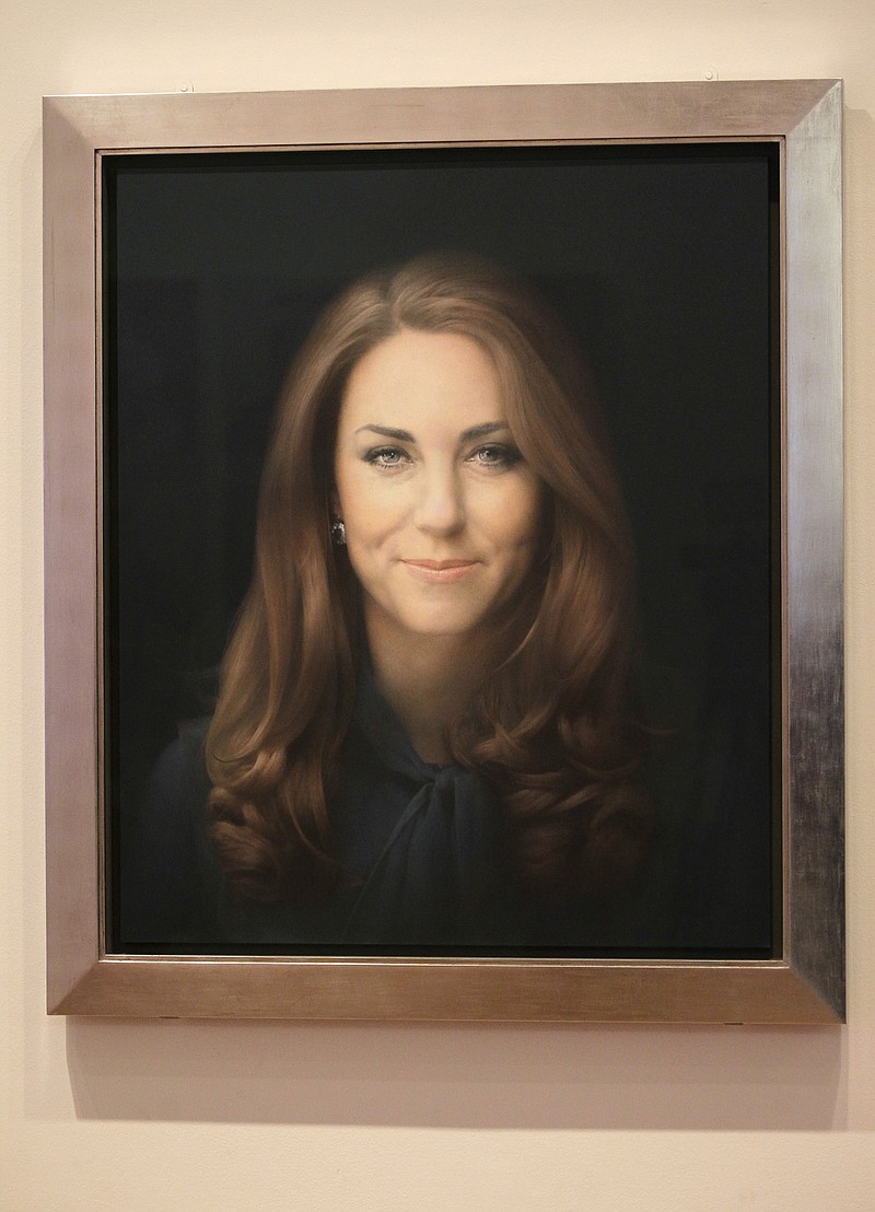 A newly-commissioned portrait of Kate, Duchess of Cambridge, by artist Paul Emsley hangs at the National Portrait Gallery in London.