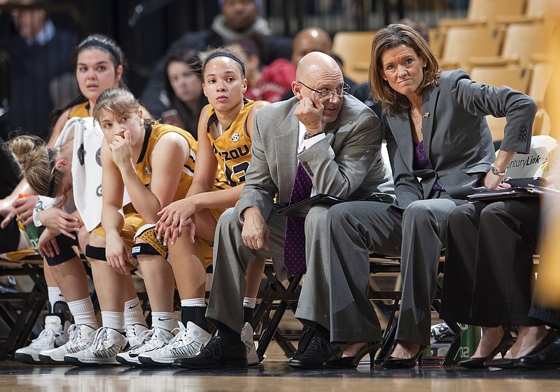 Missouri head coach Robin Pingeton, right, reacts to action late in the second half of an NCAA college game against Kentucky on Sunday, Jan. 13, 2013, in Columbia, Mo. Kentucky won 69-43. 