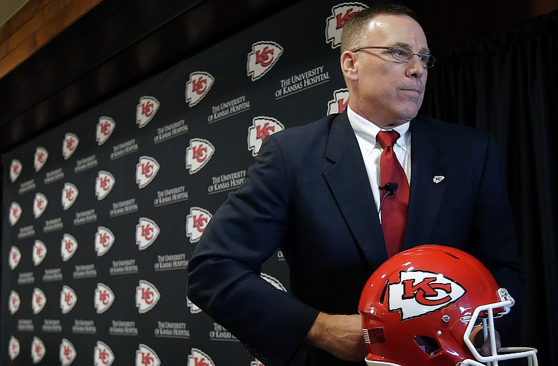 Chiefs general manager John Dorsey leaves the stage after a news conference Monday at Arrowhead Stadium.