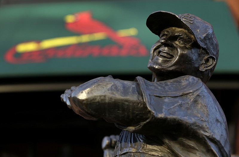 A statue of former Cardinals baseball player Stan Musial stands outside Busch Stadium on Sunday in St. Louis. Musial, one of baseball's greatest hitters and a Hall of Famer with the Cardinals for more than two decades, died Saturday.