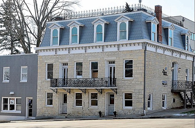 William Porth's home was built on the tall hill in Jefferson City which greeted travelers crossing the Missouri River bridge on Bolivar Street in the 1800s.