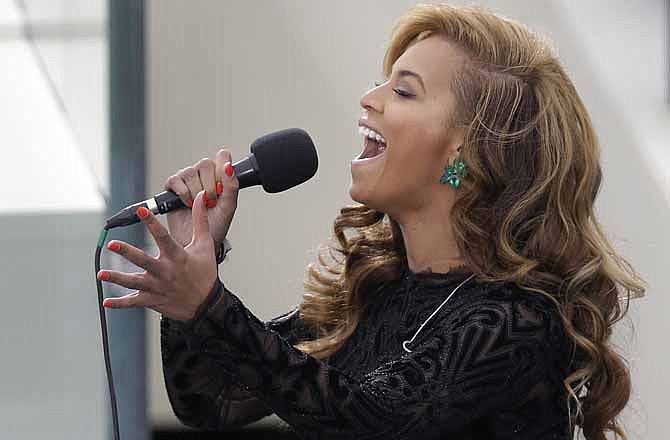 Beyonce sings the National Anthem at the ceremonial swearing-in for President Barack Obama at the U.S. Capitol during the 57th Presidential Inauguration in Washington, Monday, Jan. 21, 2013.
